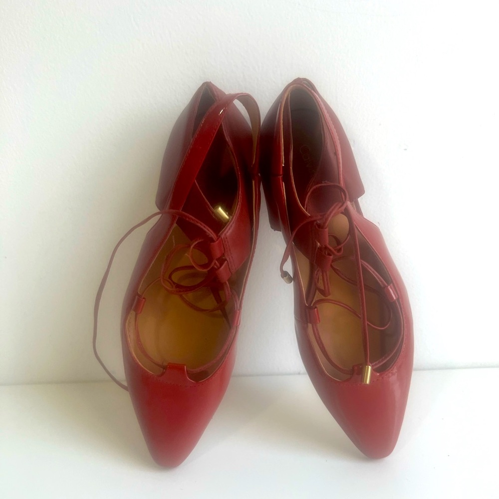 Calvin Klein red ballerina shoes.